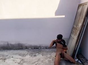 Jacking off in the street of hidden house