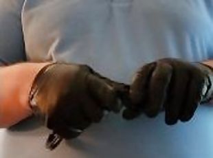 Handcuffs and leather cop gloves