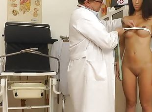 Doctor exam of a brunette young girl