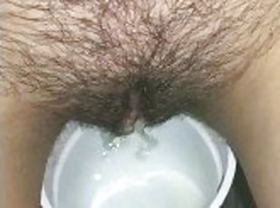 Pissing in the toilet / pee in a glass / peeing girl / golden splashes / hairy pussy