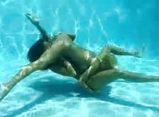 Lesbian sex underwater looks amazing