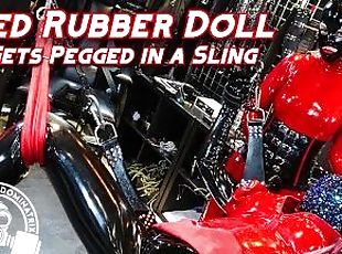 Red Rubber Doll Gets Pegged in Sling - Lady Bellatrix in latex catsuit with strapon